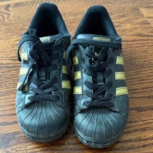 Adidas Black and Gold Sneakers